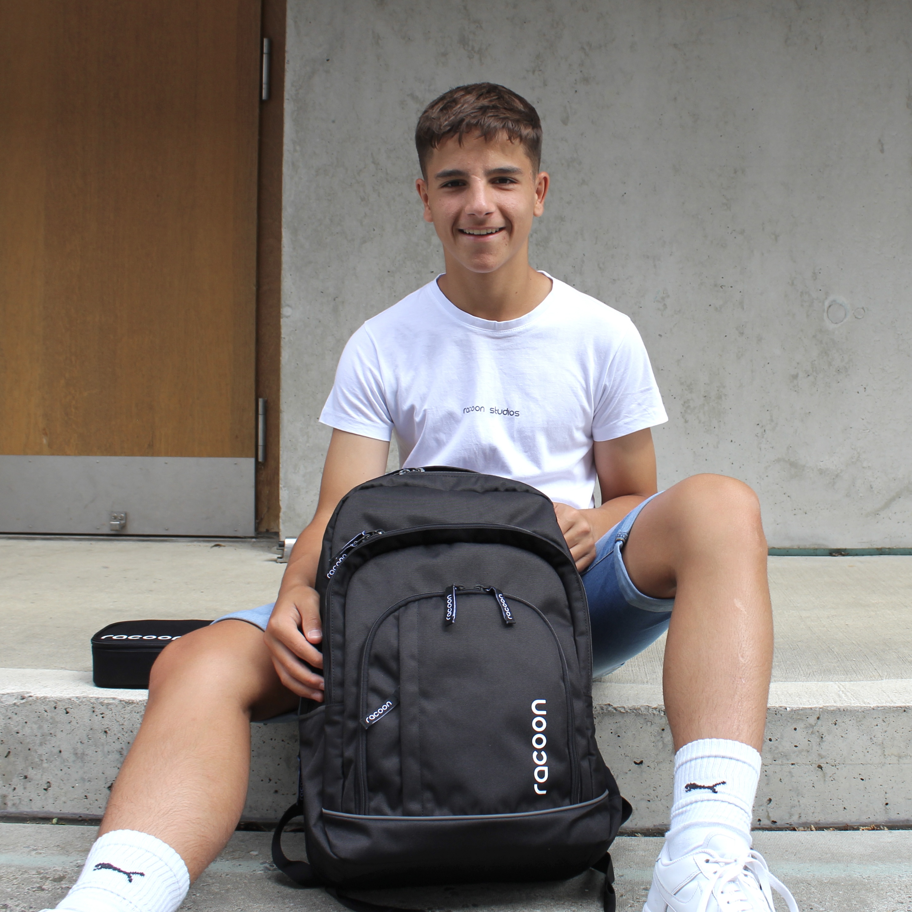 racoon schulrucksack